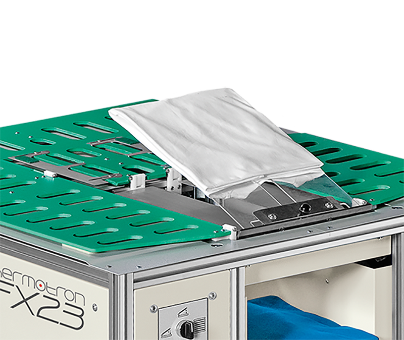 Thermotron FX-23 semi-automatic folding machine